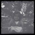 Una bambina seduta nel giardino della villa di Gaibola, detta la Vigna: Bologna
