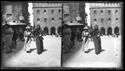 Tre donne a passeggio davanti alla basilica di San Petronio in piazza Vittorio Emanuele II:  prospetto del palazzo dei Notai sulla via de’ Pignattari e dell’ala sinistra del Palazzo Comunale: Bologna